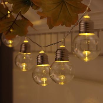 Preview: Solar-LED-Lichterkette mit 20 Glühbirnen (2,85m) – Warmweisse Garten-Lichterkette mit Dämmerungssensor & 2 Leuchtmodi, IP44